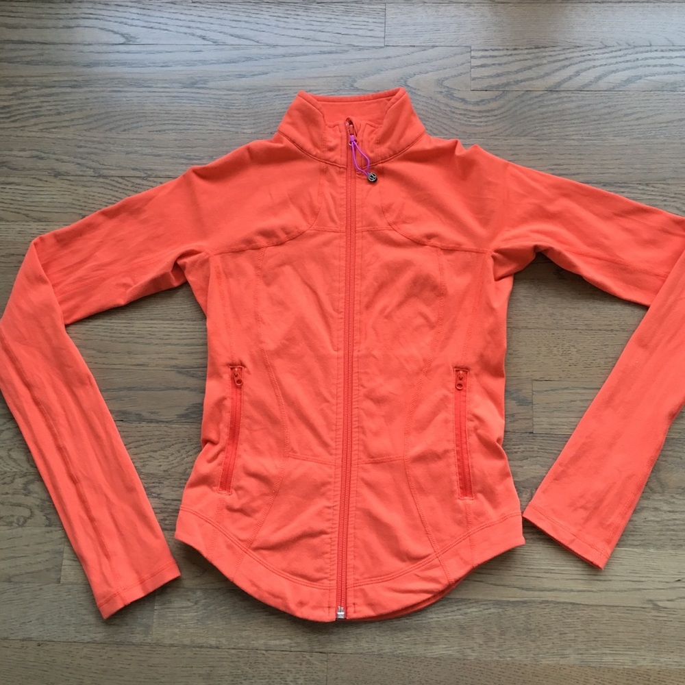 Lululemon jacket. Size 2. Orange zip up.